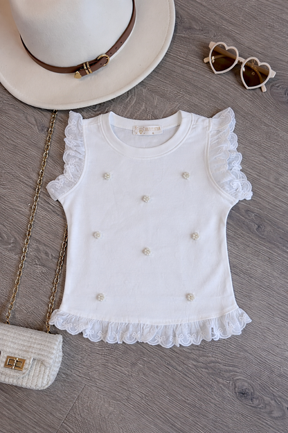 Haut blanc à volants